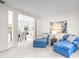 Comfortable living room featuring plush seating, neutral carpet, and open access to the dining area at 6720 Long Nook Ln, Indian Trail, NC 28079