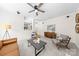 Bright living room with a fireplace, modern decor, comfortable seating, and easy kitchen access at 6720 Long Nook Ln, Indian Trail, NC 28079