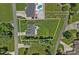 Aerial view of the property, showing lot lines, home, pool, and basketball court at 7478 Pine Ridge Dr, Denver, NC 28037