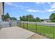 Spacious backyard featuring a well-maintained lawn, secure fencing, and a patio area for outdoor entertainment at 7478 Pine Ridge Dr, Denver, NC 28037