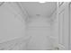 Spacious walk-in closet features ample shelving and storage for all your wardrobe needs at 7478 Pine Ridge Dr, Denver, NC 28037