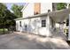Back exterior featuring a concrete patio and covered porch for outdoor enjoyment at 8012 Red Lantern Rd, Indian Trail, NC 28079