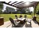 Backyard featuring a pergola-covered patio with stylish outdoor furniture at 8012 Red Lantern Rd, Indian Trail, NC 28079