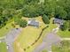 Expansive aerial view of a home with a sprawling yard, showcasing its prime location within a lush community at 814 Carved Oak Ct, York, SC 29745
