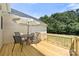 Back deck with table and umbrella at 814 Carved Oak Ct, York, SC 29745