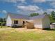 Backyard featuring a deck and a lush yard at 814 Carved Oak Ct, York, SC 29745
