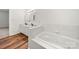 Bright bathroom featuring a soaking tub and double vanity sinks with modern fixtures at 814 Carved Oak Ct, York, SC 29745