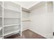 Walk-in closet with shelving and storage space, offering an organized solution for clothes and accessories at 814 Carved Oak Ct, York, SC 29745