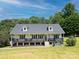 Lovely home with a welcoming front porch, perfect for enjoying the scenic views and tranquil surroundings at 814 Carved Oak Ct, York, SC 29745