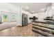 Modern kitchen featuring stainless steel appliances, sleek countertops, and white cabinetry at 814 Carved Oak Ct, York, SC 29745
