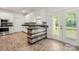 Kitchen featuring white cabinets, stainless steel appliances, and a stylish butcher block island at 814 Carved Oak Ct, York, SC 29745