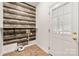Laundry room featuring wood-look tile wall, tile floors and modern touches at 814 Carved Oak Ct, York, SC 29745