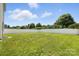 Expansive backyard with lush green grass and a privacy fence at 8152 Chilkoot Ln, Locust, NC 28097