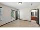 Spacious bedroom with two windows providing natural light and an ensuite bathroom at 8152 Chilkoot Ln, Locust, NC 28097