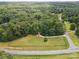 Aerial view showcasing the property's extensive wooded acreage and a long private driveway at 820 King Rd, Clover, SC 29710