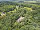 Aerial perspective of a secluded home surrounded by vibrant greenery at 820 King Rd, Clover, SC 29710