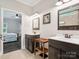 Bathroom featuring double vanity with dark wood cabinets and tiled floor at 820 King Rd, Clover, SC 29710