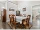 Formal dining room with wooden table and chairs, decorative rug, and elegant decor at 820 King Rd, Clover, SC 29710