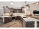 Elegant kitchen with updated appliances and an island bar for seating and dining at 820 King Rd, Clover, SC 29710