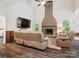 Inviting living room with fireplace and TV, perfect for cozy evenings in at 820 King Rd, Clover, SC 29710