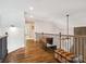 An open loft area features wood floors, natural light, and vintage decor at 820 King Rd, Clover, SC 29710