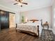 Comfortable main bedroom with ensuite bath, wooden furniture, and natural light at 820 King Rd, Clover, SC 29710