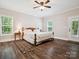 Spacious main bedroom with a ceiling fan, ensuite bath access, and natural light at 820 King Rd, Clover, SC 29710