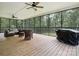 Enjoy the outdoors on this expansive screened patio, perfect for entertaining or relaxing with nature views at 820 King Rd, Clover, SC 29710