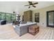 Relaxing screened-in porch with comfortable seating and an outdoor fireplace at 820 King Rd, Clover, SC 29710