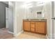 Bathroom featuring a double sink vanity with granite countertops and tile flooring at 8214 Aspen Ct, Mint Hill, NC 28227
