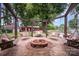 Inviting outdoor area with a fire pit and swing set perfect for enjoying cozy evenings outside at 835 Holshouser Rd, Rockwell, NC 28138