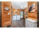 Spacious, wood-paneled laundry room with modern appliances, decor, and lots of natural light at 835 Holshouser Rd, Rockwell, NC 28138