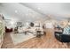 Bright and open living room with vaulted ceilings, recessed lighting and wood flooring at 835 Holshouser Rd, Rockwell, NC 28138