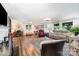Spacious living room features hardwood floors, fireplace, and comfortable seating at 835 Holshouser Rd, Rockwell, NC 28138