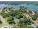 Aerial view of the community with tennis courts, lake access, and a marina at 1018 Southwest Sw Dr # 18, Davidson, NC 28036