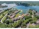 Aerial view of a condominium complex with lake access and a marina at 1018 Southwest Sw Dr # 18, Davidson, NC 28036