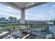 Balcony with seating area and a view of the lake and community buildings at 1018 Southwest Sw Dr # 18, Davidson, NC 28036