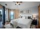Cozy bedroom with natural light, stylish decor, and a sliding door to the patio at 1018 Southwest Sw Dr # 18, Davidson, NC 28036