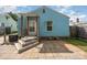 Backyard features a wooden deck with steps and a blue exterior at 1019 Richard St, Salisbury, NC 28144