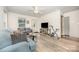 Bright living room with hardwood floors, comfortable seating, and ample natural light at 1019 Richard St, Salisbury, NC 28144