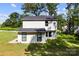 Exterior rear view of house with backyard and dark roof at 109 Landon Ct, Shelby, NC 28152