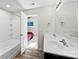 Bright bathroom with tub/shower, double sinks, and access to bedroom at 109 Landon Ct, Shelby, NC 28152