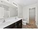Bathroom featuring a double sink vanity, a toilet, and a shower/tub combo at 109 Landon Ct, Shelby, NC 28152