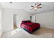 Bright bedroom features plush carpeting, ceiling fan, and neutral wall paint at 109 Landon Ct, Shelby, NC 28152