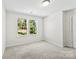 Cozy bedroom with two windows bringing in natural light and plush carpeting at 109 Landon Ct, Shelby, NC 28152