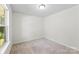 Neutral bedroom featuring carpeted flooring and ample natural light at 109 Landon Ct, Shelby, NC 28152