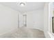 Comfortable bedroom showing neutral carpeting and doorway to hallway at 109 Landon Ct, Shelby, NC 28152