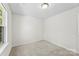 Small bedroom with comfortable neutral carpet with large bright window at 109 Landon Ct, Shelby, NC 28152