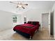 Bedroom featuring a ceiling fan, natural light, and ensuite bathroom entrance at 109 Landon Ct, Shelby, NC 28152