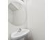 Close-up of a simple half bathroom featuring pedestal sink and round mirror at 109 Landon Ct, Shelby, NC 28152